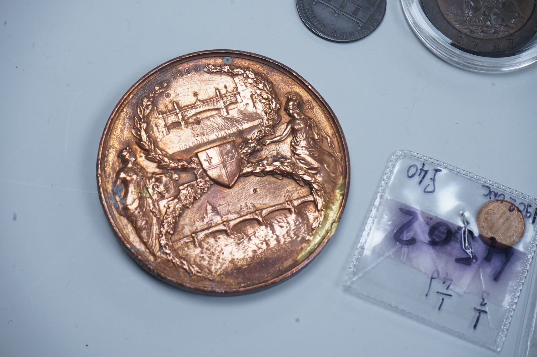 A QSA medal group miniature, comprising miniatures of; the Queen Victoria Golden Jubilee medal, the Queen’s South Africa medal with three clasps, the King’s South Africa medal with two clasps and the Africa General Servi